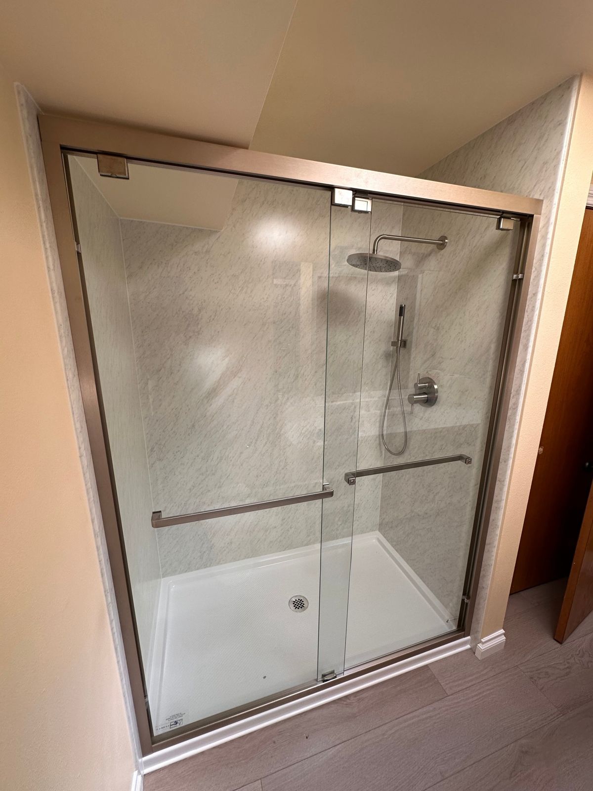 Bathroom remodel with marble glass shower