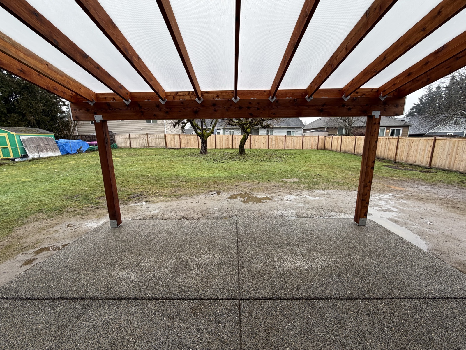 Finished all-season cedar patio cover over the deck