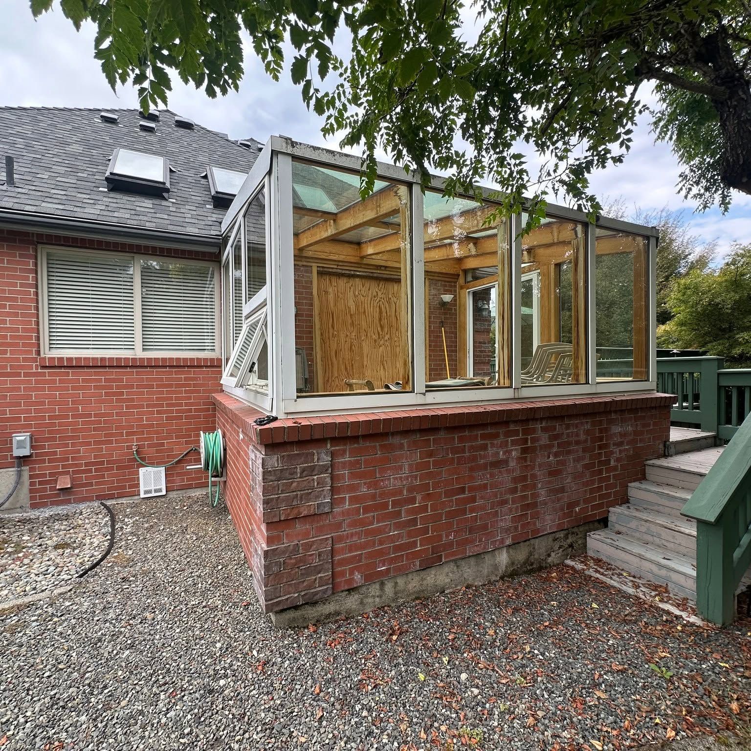 Aging glass sunroom before removal
