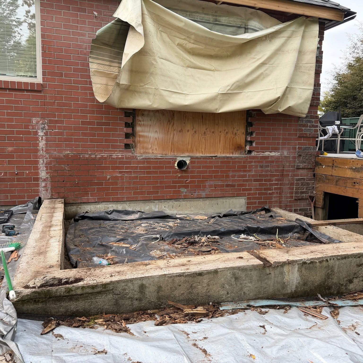Brick wall patch and foundation prep