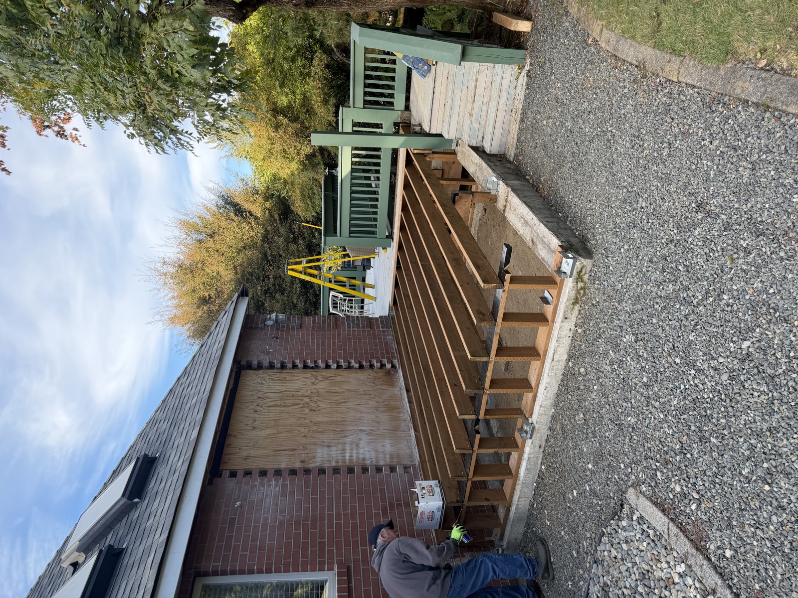 Deck rebuild framed over a new slab with the opening temporarily boarded